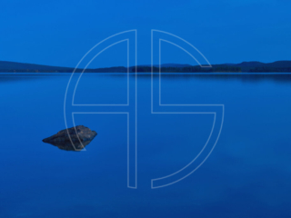 Blue hour at a lake.