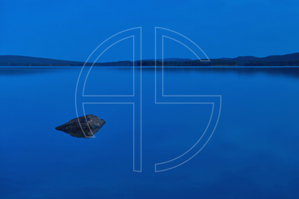 Blue hour at a lake.