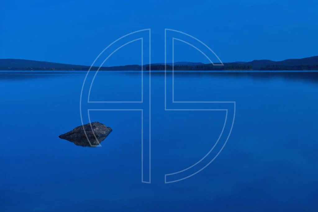 Blue hour at a lake.