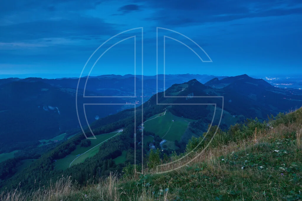 Northbound At Röti Hilly landscape at the blue hour from a vantage point.