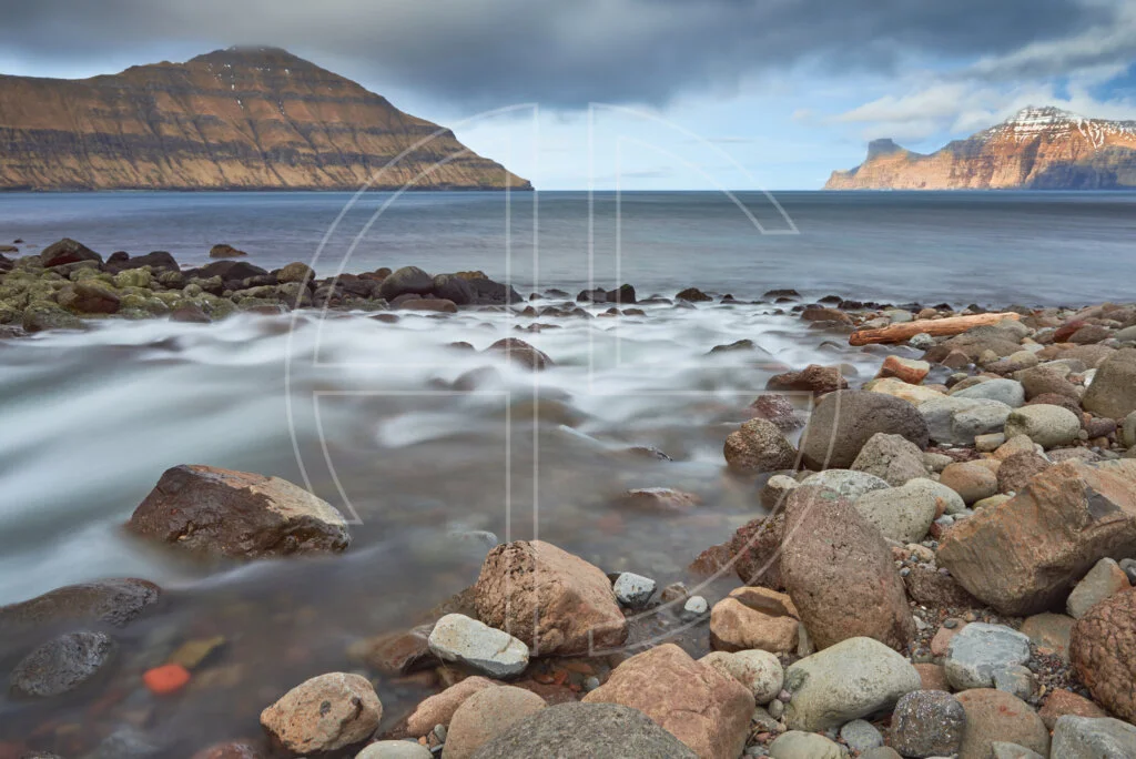 A river pours into the sea.