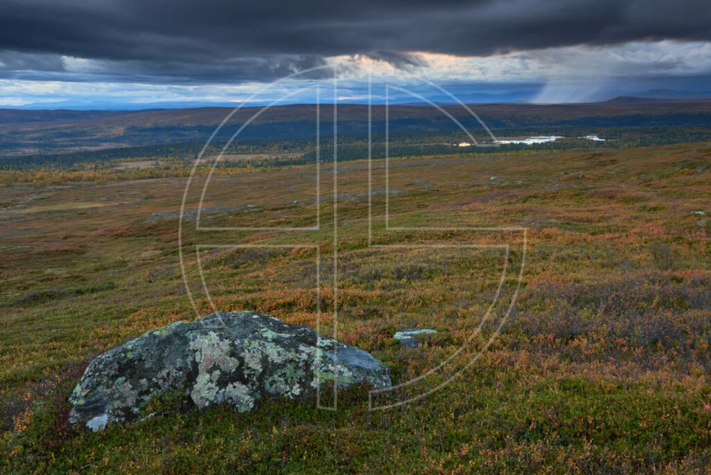The Clock Stops Fjell landscape with dark sky. A solitary rain cloud drifts to the right.