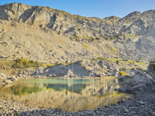 Mountain lake in soft evening light.